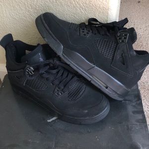 Air Jordan 4 Retro, all black size 4.5